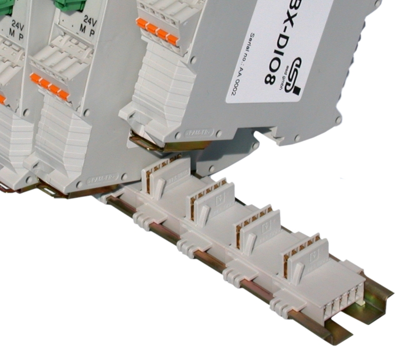 Image detail of various CAN-CBX modules with InRailBus on a mounting rail